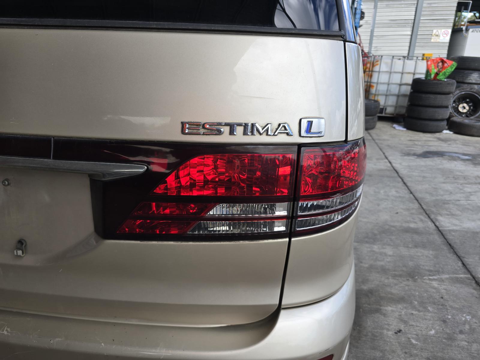 Rear Garnish Estima Toyota 2004