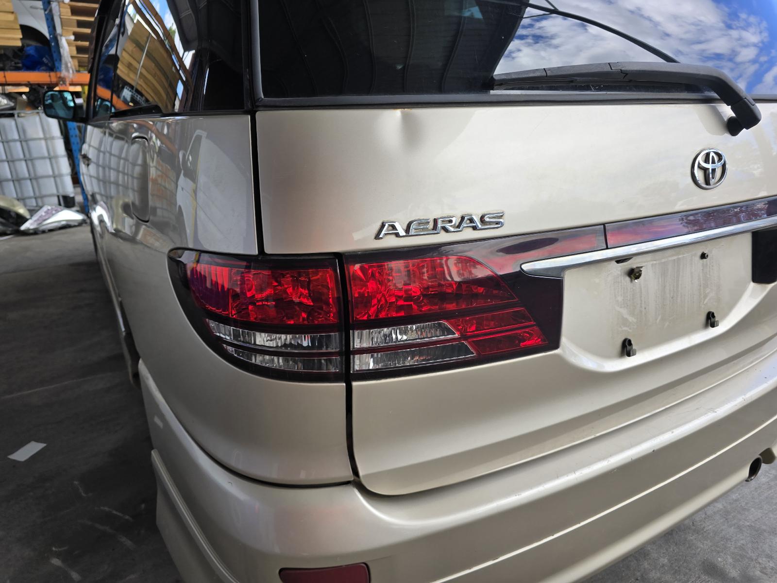 Rear Garnish Estima Toyota 2004